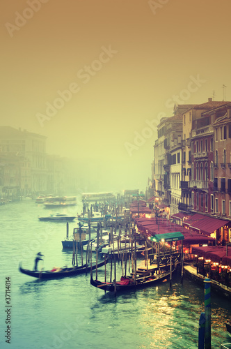 Grand Canal at a foggy evening. Venice - Italy photo