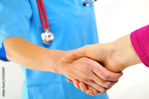 doctor shaking hands © Laurentiu Iordache