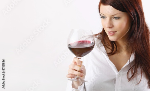 young beautiful woman drinking wine - with copyspace