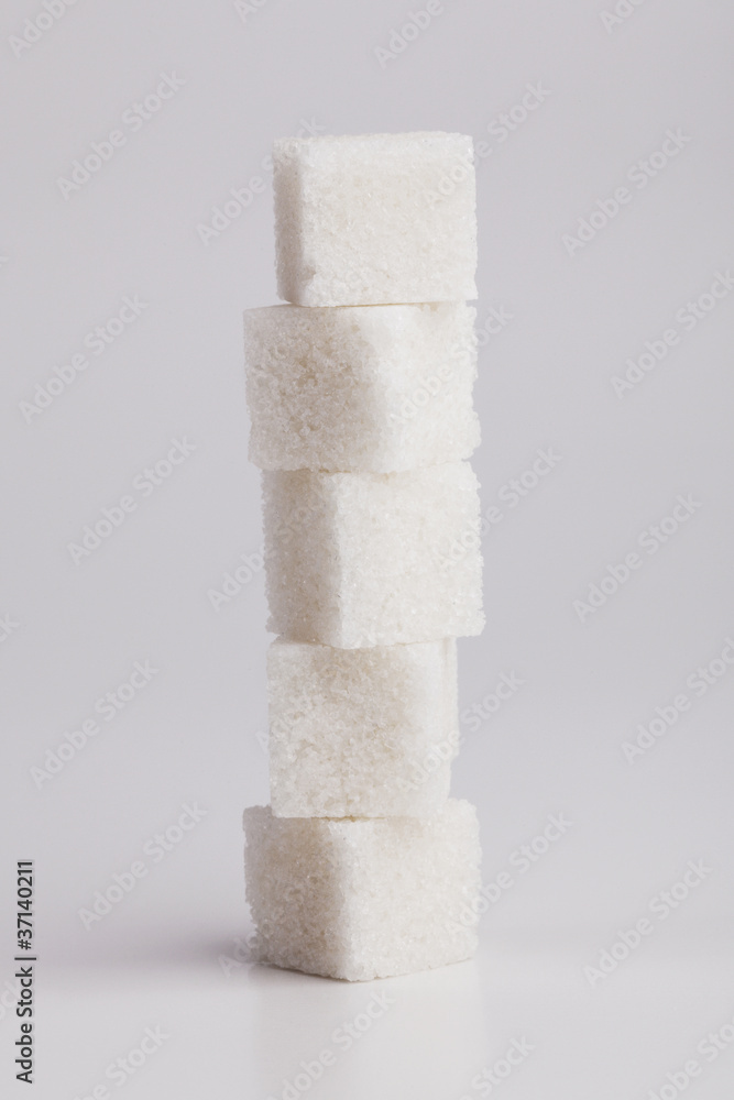 Five lumps of sugar on each other Five lumps of sugar on each other