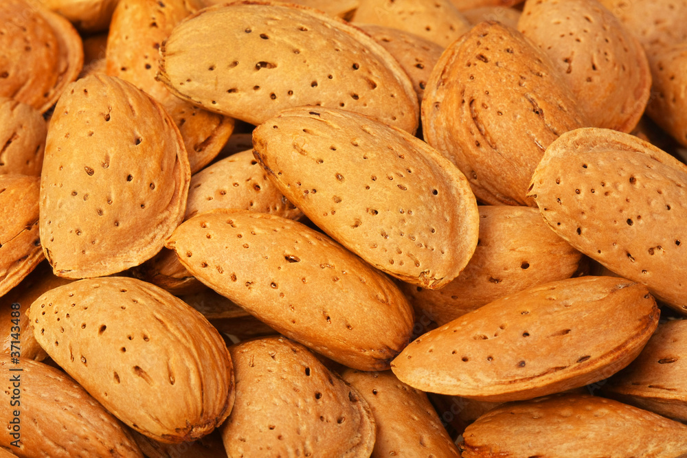 Dried almonds closeup, background Dried almonds closeup, background