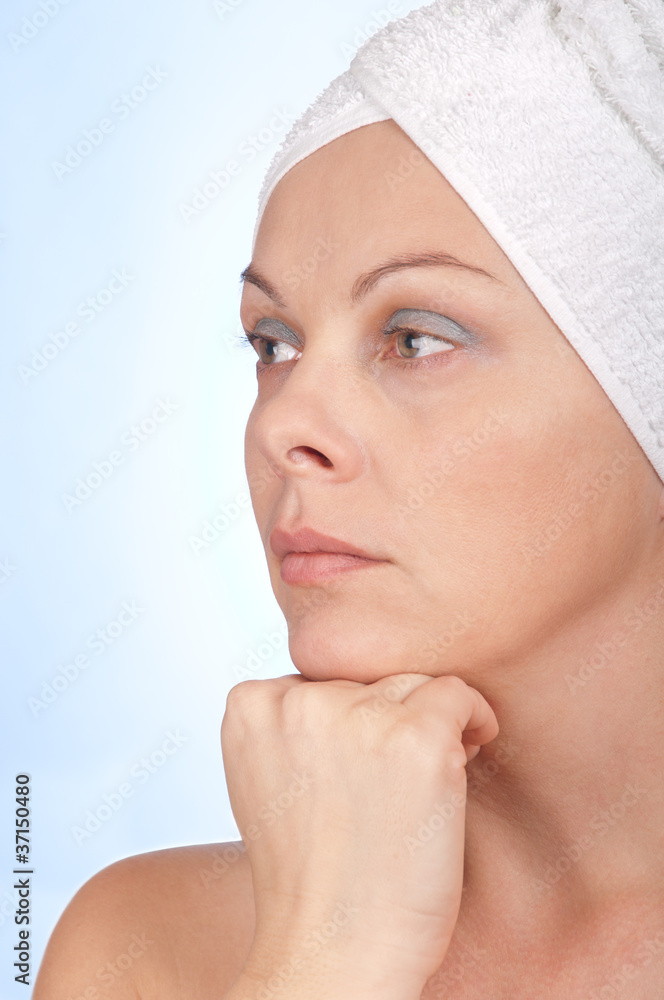 Beautiful young woman after shower with towel and with thumb up Beautiful young woman after shower with towel and with thumb up