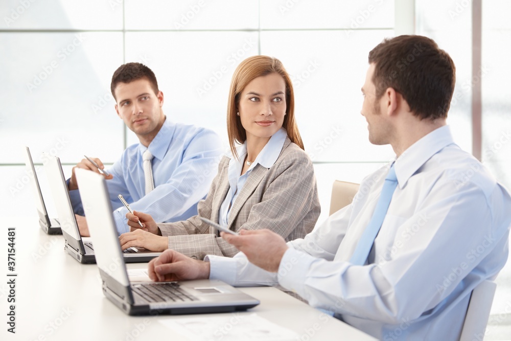 Young businessteam working together in office Young businessteam working together in office