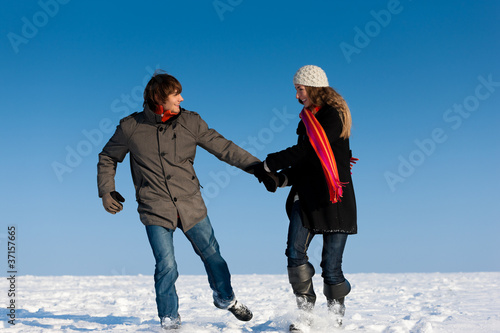 Couple having a winter walk