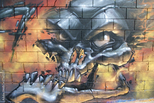 Arte urbano. Detalle de un graffiti en una pared
