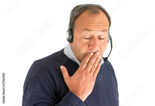Obraz na płótnie Gähnender Mann mit Headset