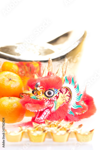Chinese new year with dragon and ingot close up