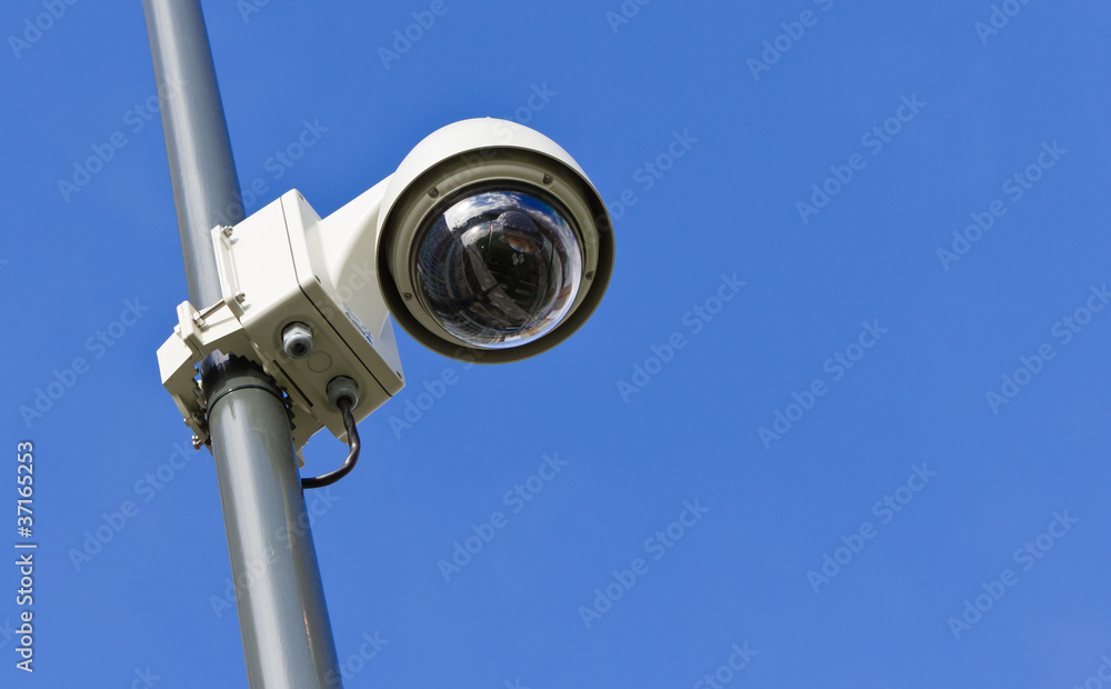 Modern Surveillance camera from low angle Modern Surveillance camera from low angle