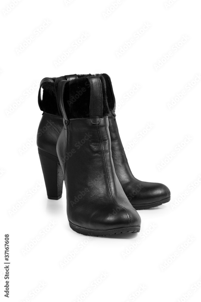 Stylish black leather women's boots  isolated on white
