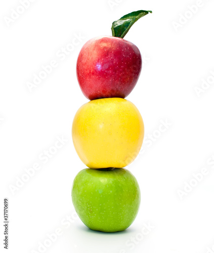 traffic light of apples on a white background