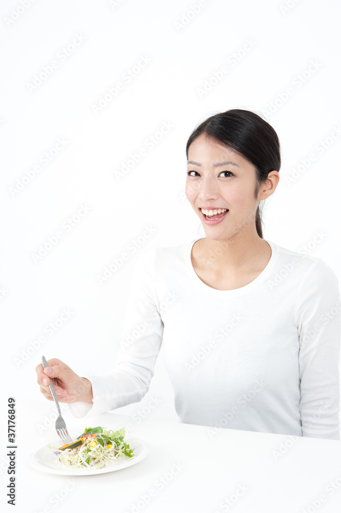 attractive asian woman eating salad attractive asian woman eating salad