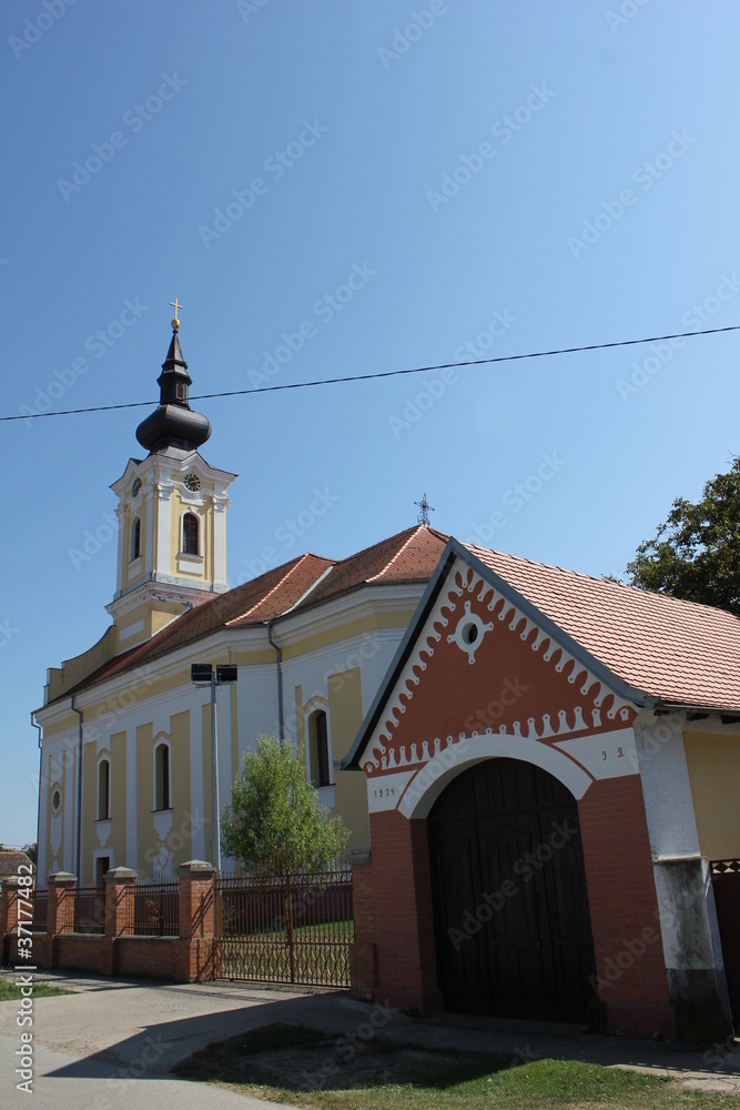 Naklejka premium Kirche und Kutschenhaus