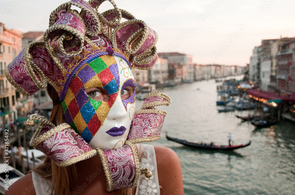 Carnival in Venice - beautiful girl in carnival mask