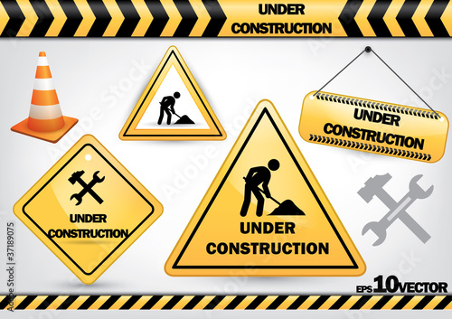 collection of under construction signs