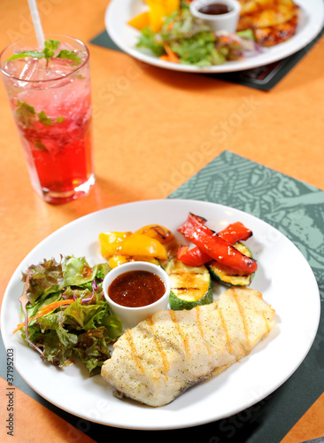 Fish steak with vegetables
