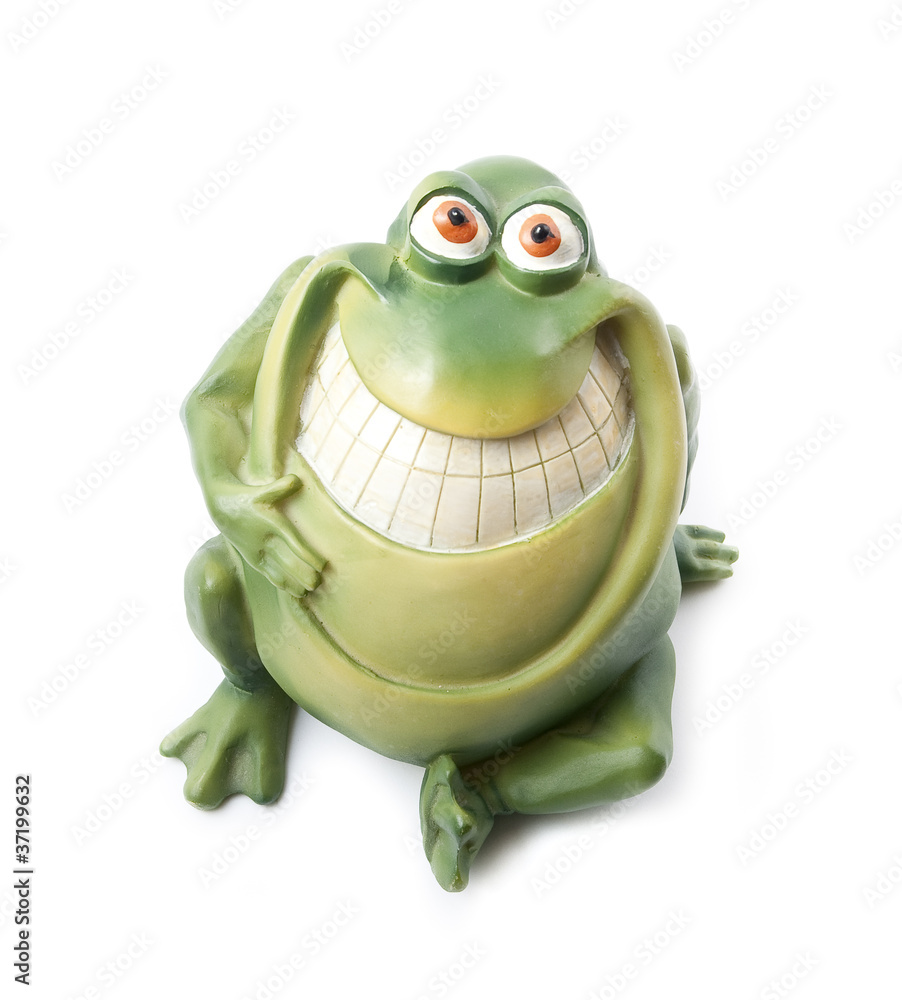 Fototapeta premium Smiling plastic frog isolated on the white background.