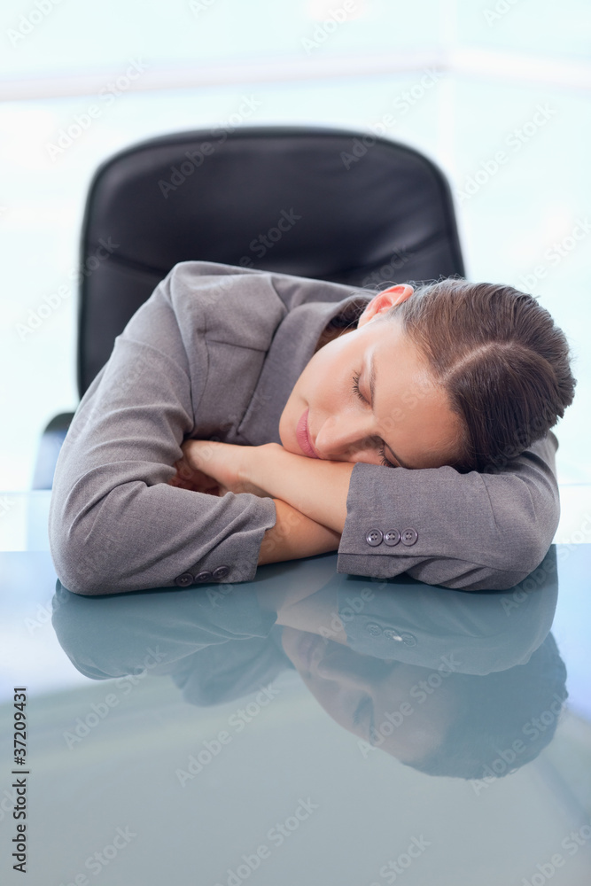 Portrait of a tired businesswoman sleeping Portrait of a tired businesswoman sleeping