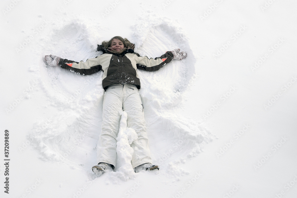 girl having fun in the snow