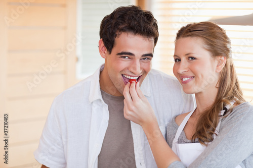 Happy couple enjoys cooking together