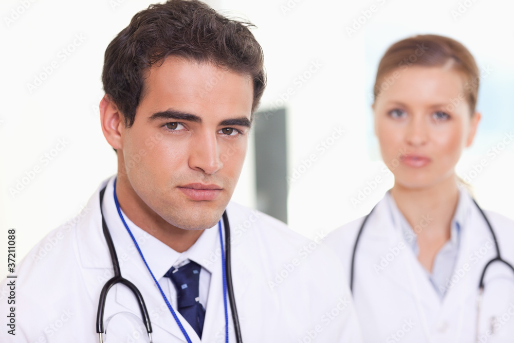 Medical assistants standing next to each other Medical assistants standing next to each other