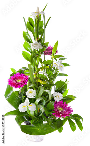 Fototapeta Naklejka Na Ścianę i Meble -  Bright flower bouquet in basket isolated over white background
