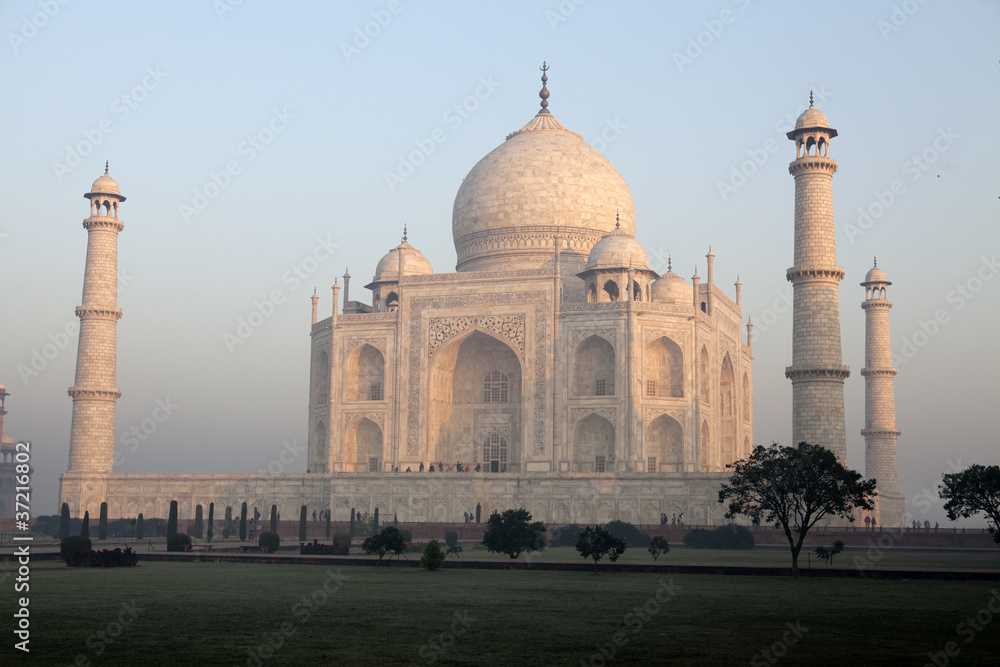 Taj Mahal in Agra with a slightly pink colour during sunrise