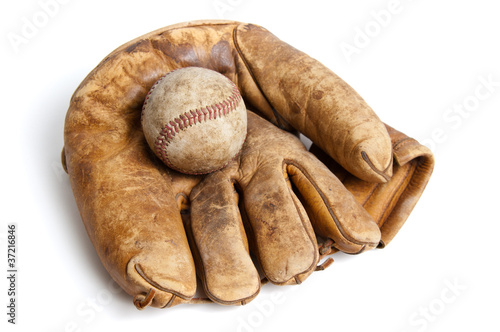 Vintage baseball glove and ball isolated on white