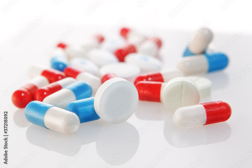 diverse group of tablets and capsules. diverse group of tablets and capsules.