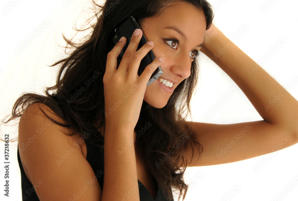 Beautiful half indian girl with mobile phone / cell phone Beautiful half indian girl with mobile phone / cell phone