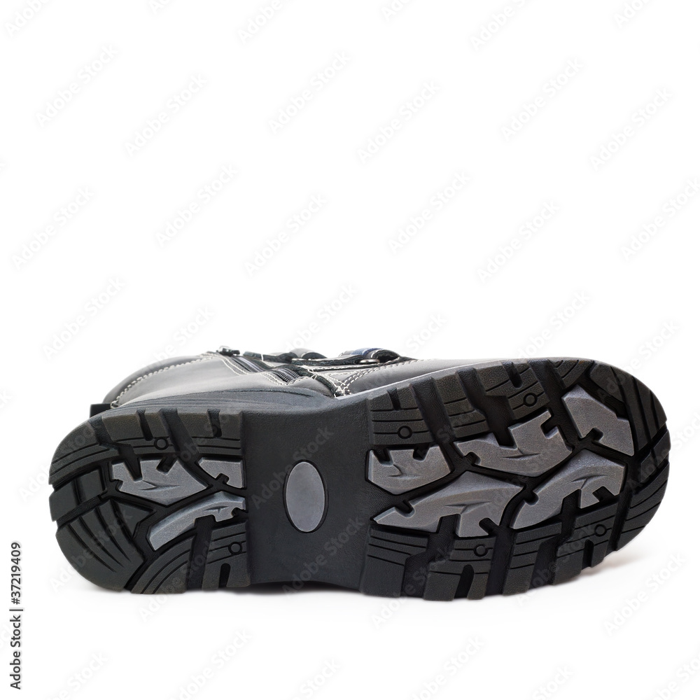 Fototapeta premium sole winter boots isolated on white background