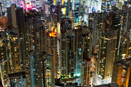 buildings at night in Hong Kong © leungchopan