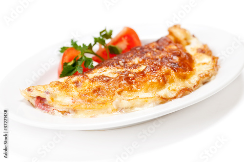 Omelet with herbs and tomatoes