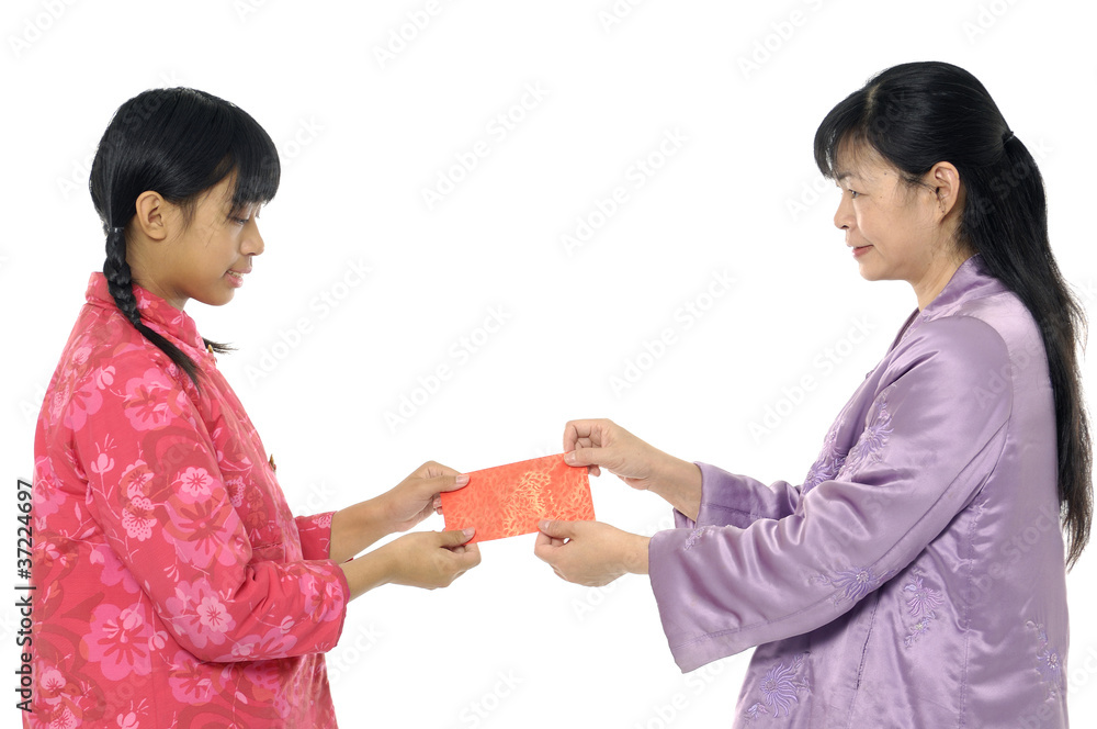 Mother and daughter with Cheongsam holding a red packet Mother and daughter with Cheongsam holding a red packet