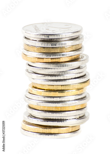 Stack of coins isolated on white photo