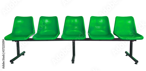 green plastic chairs isolated on white