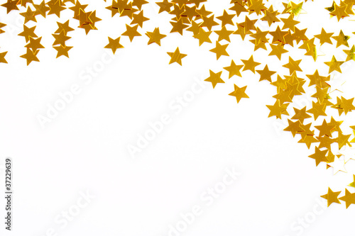 Christmas decoration of golden confetti stars