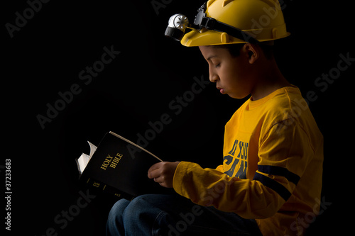 Child Studying Bible