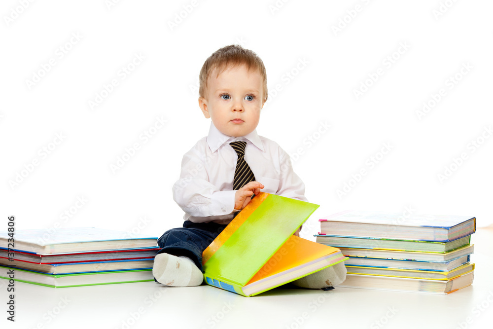 baby boy with books over white baby boy with books over white