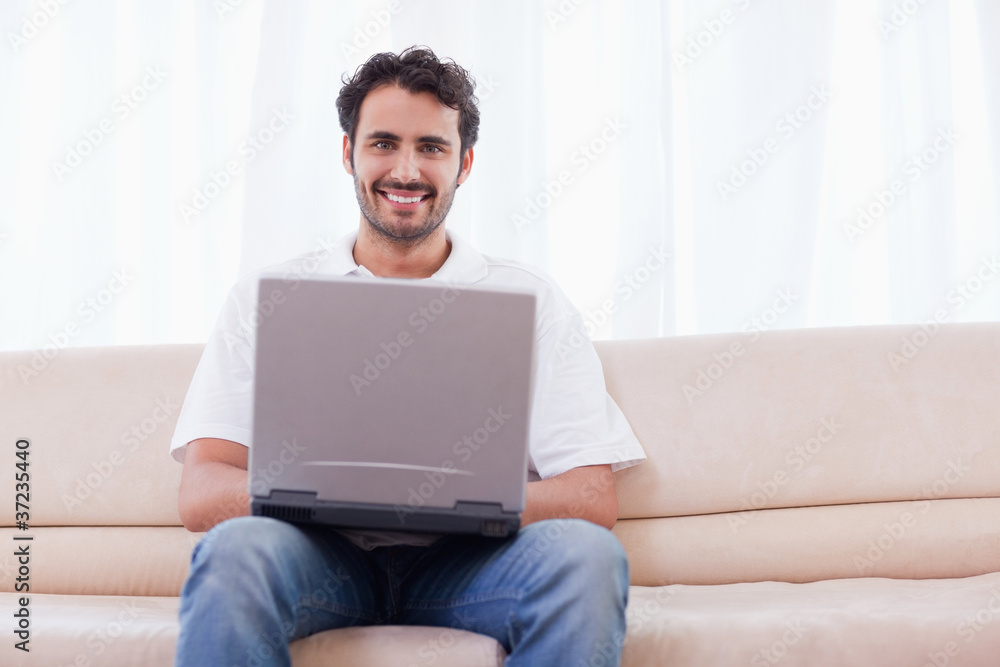 Young man using a laptop Young man using a laptop