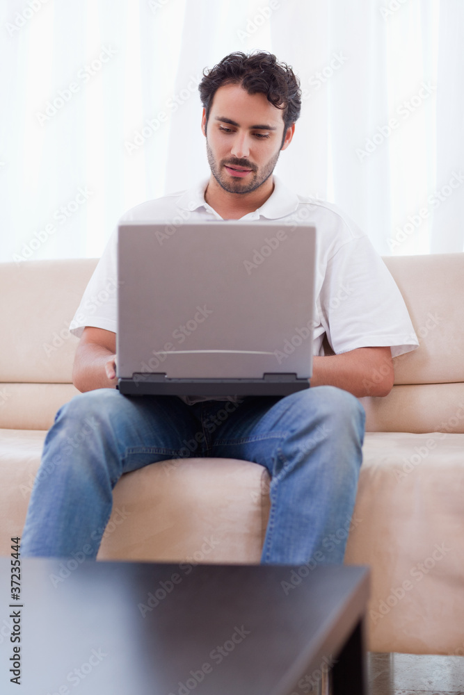 Portrait of a man using a laptop Portrait of a man using a laptop