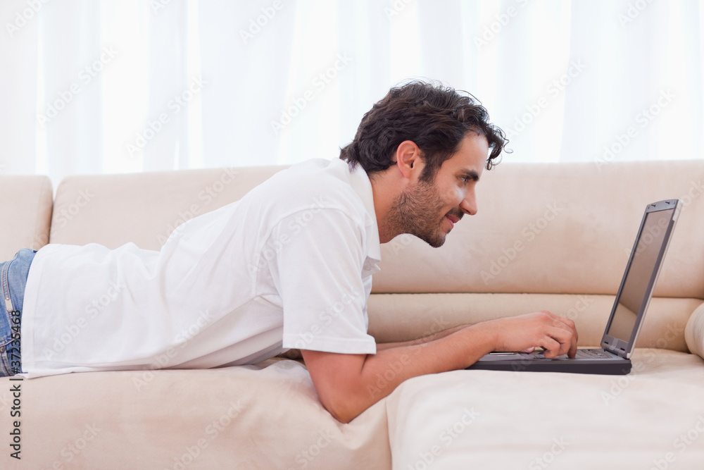 Handsome man using a laptop Handsome man using a laptop