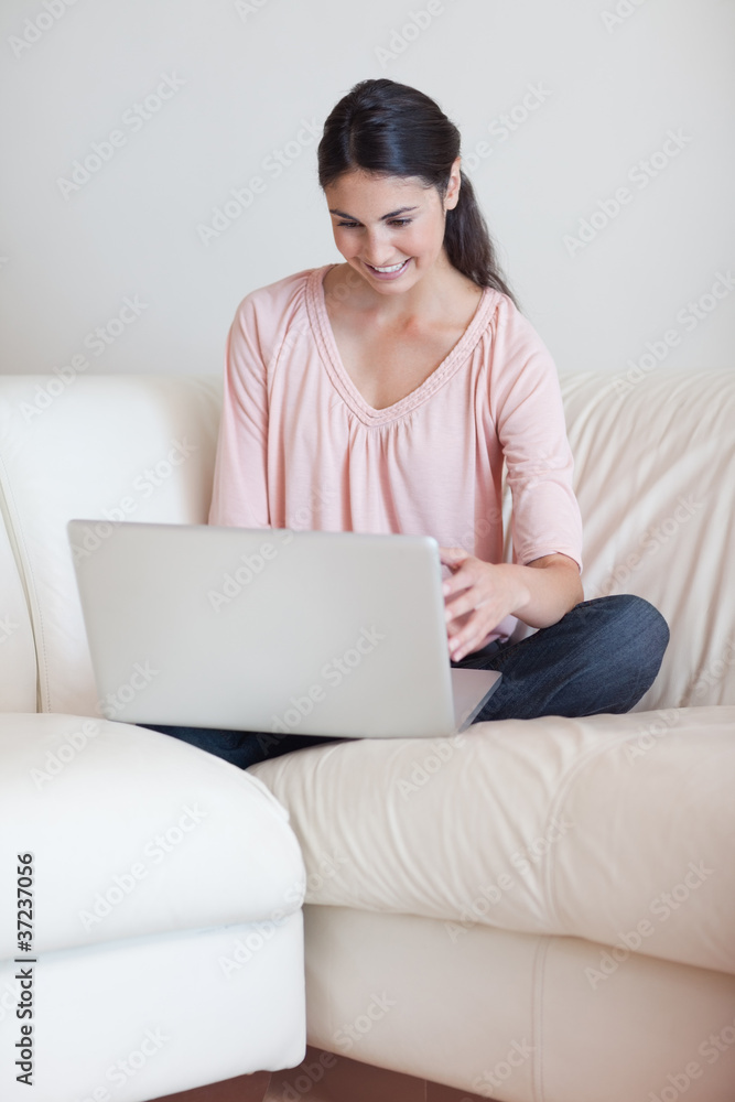 Portrait of a woman using a notebook Portrait of a woman using a notebook