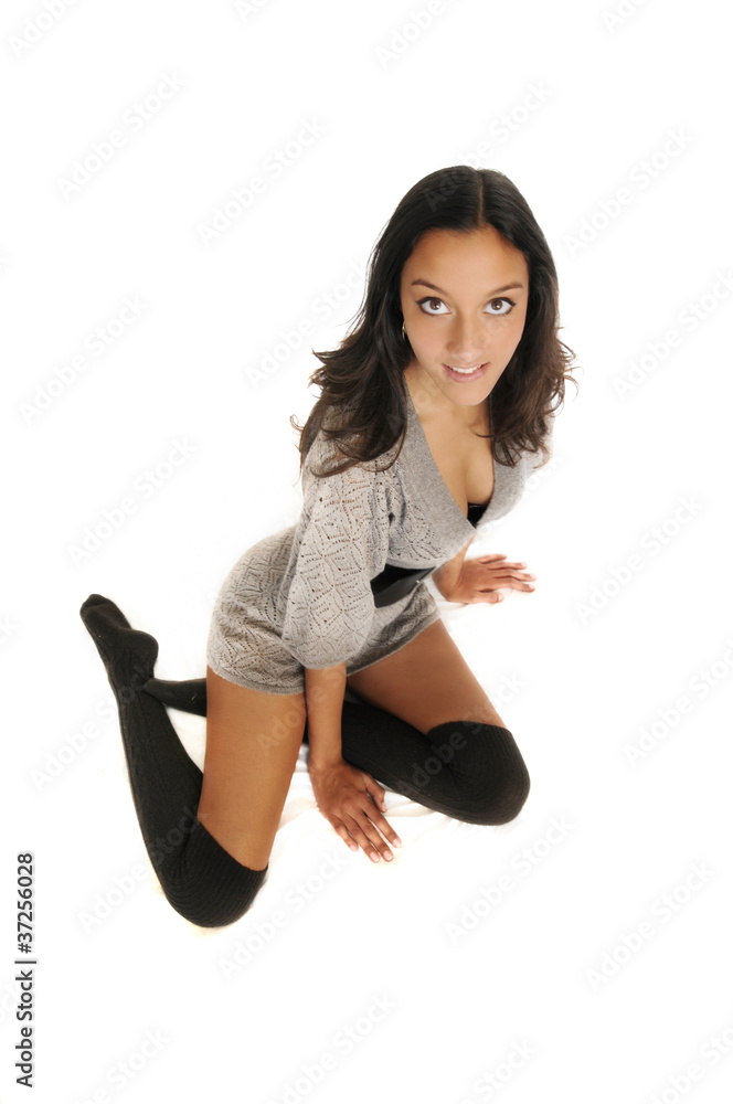 Seductive sexy kneeling half indian girl Stock Photo | Adobe Stock