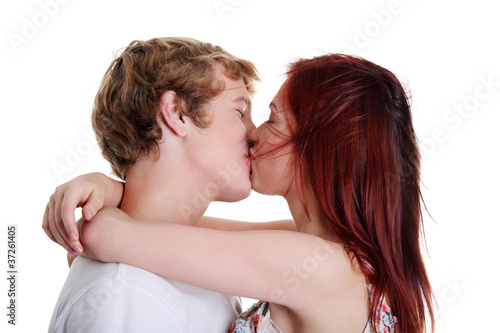 Closeup of couple kissing each other.