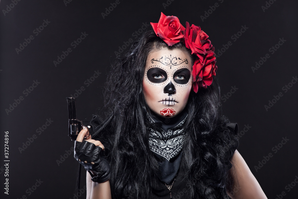 Serious woman in day of the dead mask portrait Serious woman in day of the dead mask portrait
