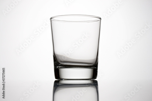 Wallpaper Mural An empty glass on a grey background Torontodigital.ca