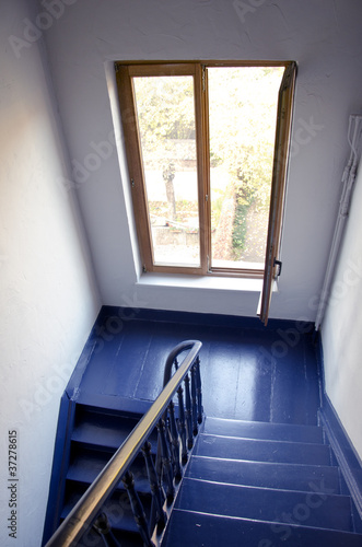 blue staircase and window