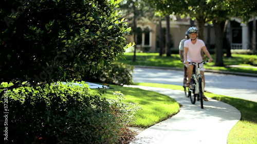 Wallpaper Mural Fit & Healthy Retired Couple Cycling Together Torontodigital.ca