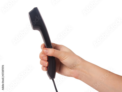 Female hand giving a phone tube