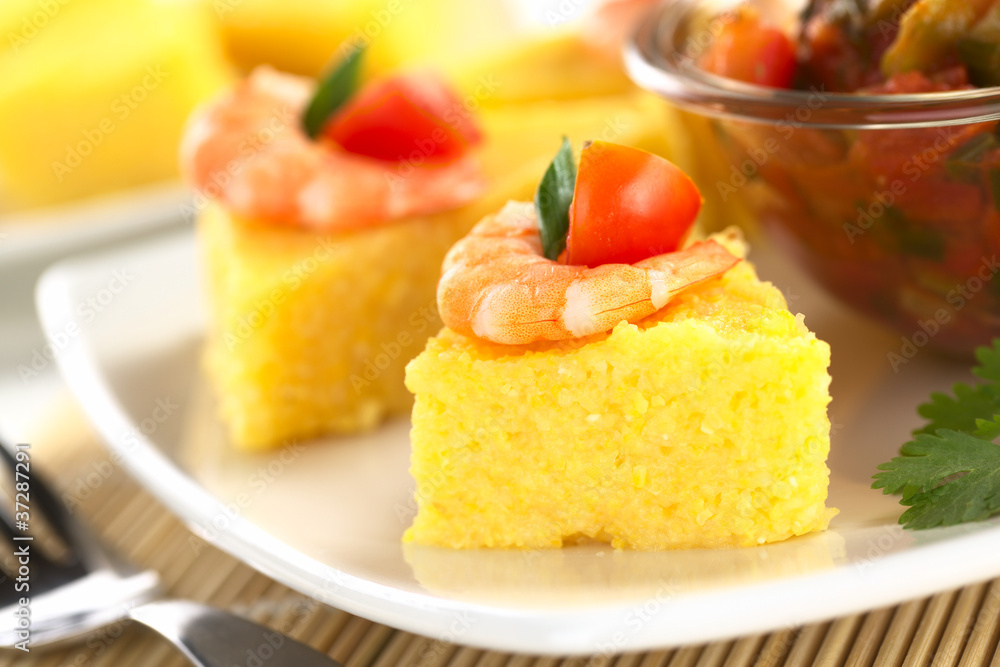 Polenta slices with shrimp and cherry tomato Polenta slices with shrimp and cherry tomato